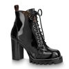 Replica Louis Vuitton LV Women Star Trail Ankle Boot in Black Glazed Calf Leather with Monogram Canvas-Black